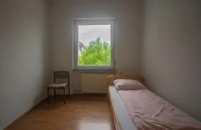 Ein Bett oder Betten in einem Zimmer der Unterkunft Ferienwohnung Glaser
