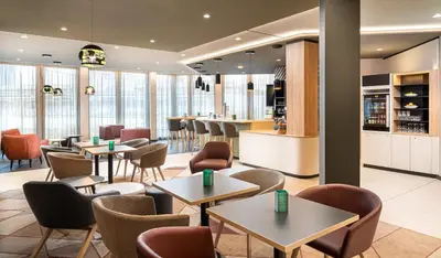Ein Sitzbereich in der Unterkunft Holiday Inn - Mannheim City - Hauptbahnhof by IHG