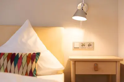Ein Bett oder Betten in einem Zimmer der Unterkunft Hotel Herrnbrod & Ständecke