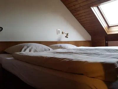 Ein Bett oder Betten in einem Zimmer der Unterkunft Haus Talblick
