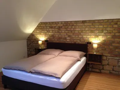 Ein Bett oder Betten in einem Zimmer der Unterkunft Gästehaus Janson