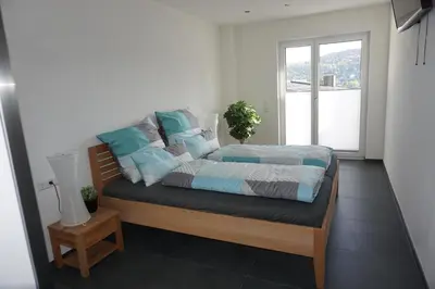 Ein Bett oder Betten in einem Zimmer der Unterkunft Ferienwohnung Schauinsland