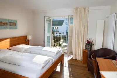 Ein Bett oder Betten in einem Zimmer der Unterkunft Rieslinghof
