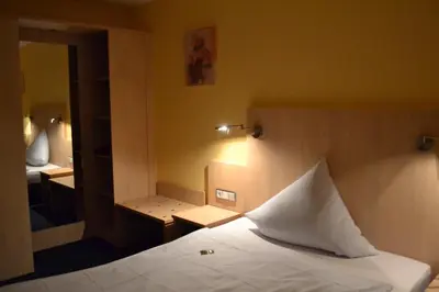 Ein Bett oder Betten in einem Zimmer der Unterkunft Landgasthof Hock