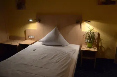 Ein Bett oder Betten in einem Zimmer der Unterkunft Landgasthof Hock