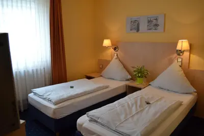 Ein Bett oder Betten in einem Zimmer der Unterkunft Landgasthof Hock