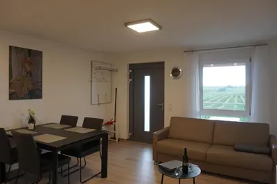 Ein Sitzbereich in der Unterkunft Weingut Schaaf