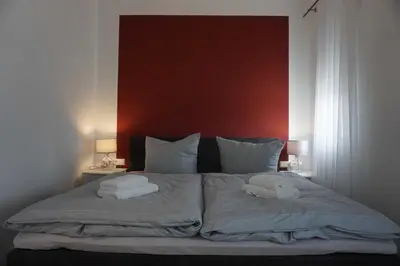 Ein Bett oder Betten in einem Zimmer der Unterkunft Weingut Schaaf