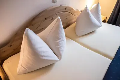 Ein Bett oder Betten in einem Zimmer der Unterkunft Marktplatzhotel - Restaurant Tafelspitz