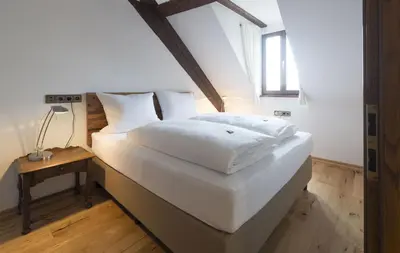 Ein Bett oder Betten in einem Zimmer der Unterkunft Hotel Ochsen Post