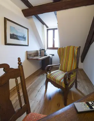 Ein Sitzbereich in der Unterkunft Hotel Ochsen Post