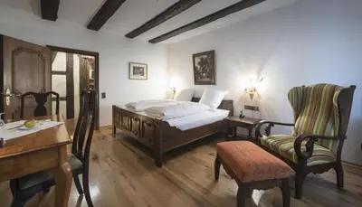 Ein Bett oder Betten in einem Zimmer der Unterkunft Hotel Ochsen Post