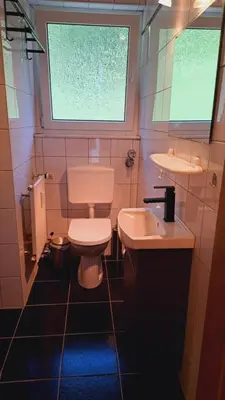 Ein Badezimmer in der Unterkunft Ferienwohnung Jasmin in Schönau bei Heidelberg Fewo 1 mit Terrasse