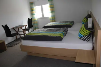 Ein Bett oder Betten in einem Zimmer der Unterkunft Winzerhof Schmid