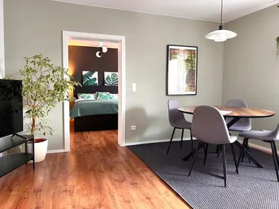 Ein Sitzbereich in der Unterkunft Hen-Coop Inn Appartement mit zwei Schlafzimmern & Netflix