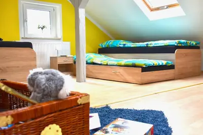 Ein Bett oder Betten in einem Zimmer der Unterkunft Ferienwohnung Familie Mechler