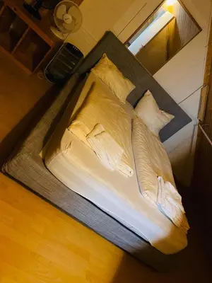 Ein Bett oder Betten in einem Zimmer der Unterkunft Zimmer im Dachgeschoss