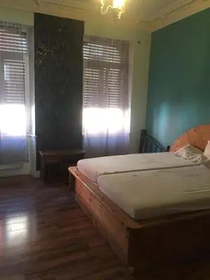 Ein Bett oder Betten in einem Zimmer der Unterkunft Zimmer im Dachgeschoss
