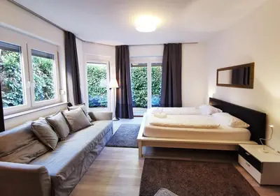 Ein Bett oder Betten in einem Zimmer der Unterkunft CF13 30m2 Central with Terrace AC and Netflix