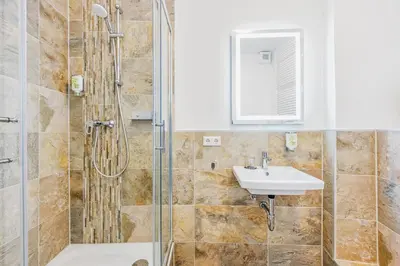 Ein Badezimmer in der Unterkunft Hotel Phoenix