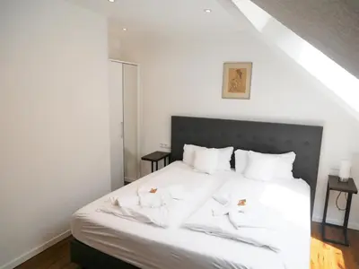 Ein Bett oder Betten in einem Zimmer der Unterkunft Hotel Phoenix