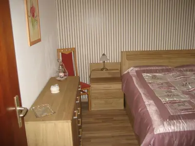 Ein Bett oder Betten in einem Zimmer der Unterkunft Ferienwohnung Schehl
