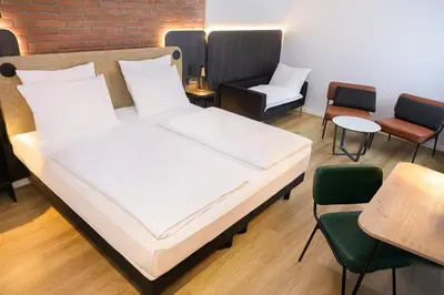 Ein Bett oder Betten in einem Zimmer der Unterkunft Tulip Inn Ludwigshafen City