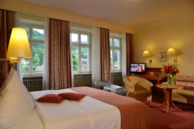 Ein Bett oder Betten in einem Zimmer der Unterkunft City Partner Hotel Holländer Hof