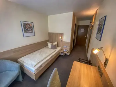 Ein Bett oder Betten in einem Zimmer der Unterkunft City Partner Hotel Berliner Hof