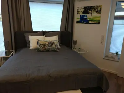 Ein Bett oder Betten in einem Zimmer der Unterkunft Strietpartment - 2 Schlafzimmer, viel Raum und Ruhe