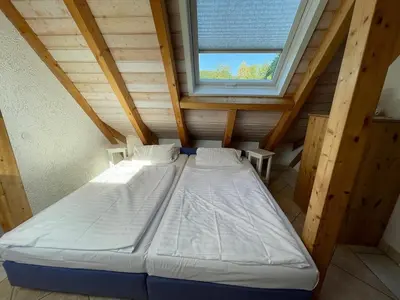 Ein Bett oder Betten in einem Zimmer der Unterkunft Glattbacher Hof Ferienwohnung 10