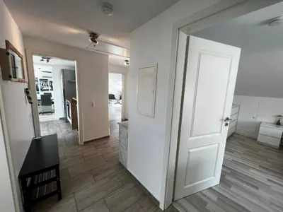 Ein Bett oder Betten in einem Zimmer der Unterkunft Ferienwohnung Schlüter Nußloch