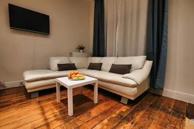 Ein Sitzbereich in der Unterkunft Appartement Deluxe, Monteurwohnung
