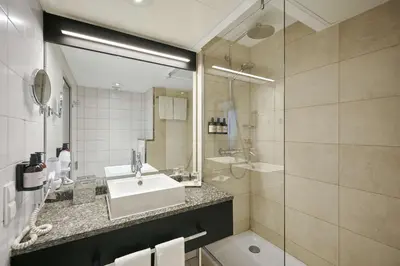 Ein Badezimmer in der Unterkunft NH Frankfurt Airport