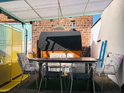 Ein Sitzbereich in der Unterkunft Hencoop 2 room apartment kitchen bathroom and optional Sauna