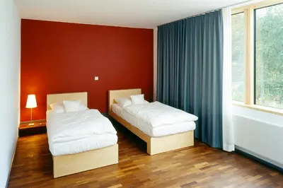 Ein Bett oder Betten in einem Zimmer der Unterkunft seehaus forelle haeckenhaus