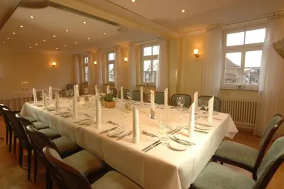 Ein Restaurant oder anderes Speiselokal in der Unterkunft Landschloss Korntal