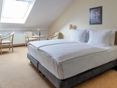 Ein Bett oder Betten in einem Zimmer der Unterkunft Mercure Hotel Frankfurt Airport Langen
