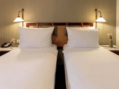 Ein Bett oder Betten in einem Zimmer der Unterkunft Mercure Hotel Frankfurt Airport Langen