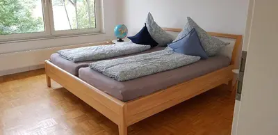 Ein Bett oder Betten in einem Zimmer der Unterkunft Haus Rebenblick