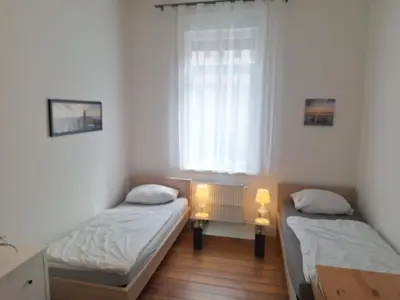 Ein Bett oder Betten in einem Zimmer der Unterkunft Apartment Comfort, Monteurwohnung