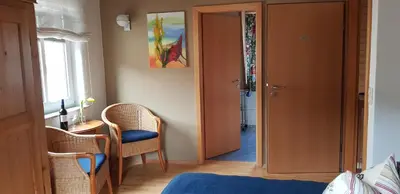 Ein Sitzbereich in der Unterkunft Weingut Schunck
