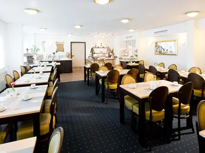 Ein Restaurant oder anderes Speiselokal in der Unterkunft ACHAT Hotel Darmstadt Griesheim
