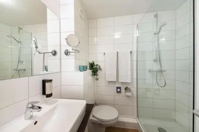 Ein Badezimmer in der Unterkunft ACHAT Hotel Schwetzingen Heidelberg