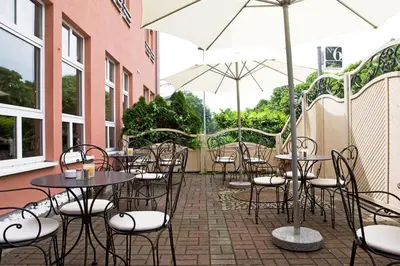 Ein Restaurant oder anderes Speiselokal in der Unterkunft ACHAT Hotel Schwetzingen Heidelberg