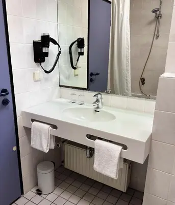 Ein Badezimmer in der Unterkunft Coffee Fellows Hotel Frankfurt Airport-Langen