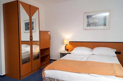 Ein Bett oder Betten in einem Zimmer der Unterkunft Trip Inn Kongresshotel Frankfurt-Rodgau