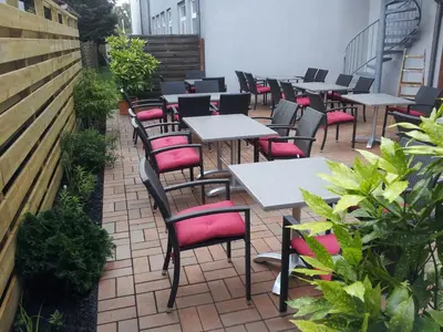 Ein Restaurant oder anderes Speiselokal in der Unterkunft Trip Inn Kongresshotel Frankfurt-Rodgau