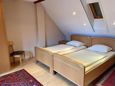 Ein Bett oder Betten in einem Zimmer der Unterkunft Hotel Bett & Frühstück