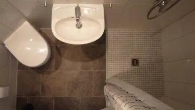 Ein Badezimmer in der Unterkunft Hotel Garni Pension Ruth